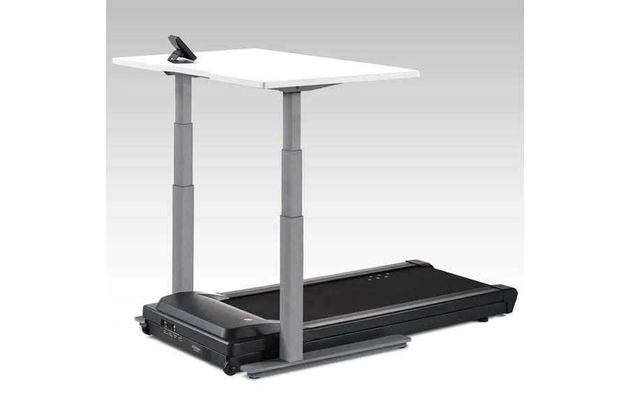 LifeSpan TR5000-Omni black treadmill with white adjustable desk surface and gray support columns on gray background