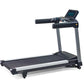 Black and gray light-commercial treadmill with digital display console, cushioned running deck, and sturdy frame on white bac