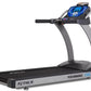 True Performance 100 treadmill with gray frame, black running deck, and blue digital display console on white background