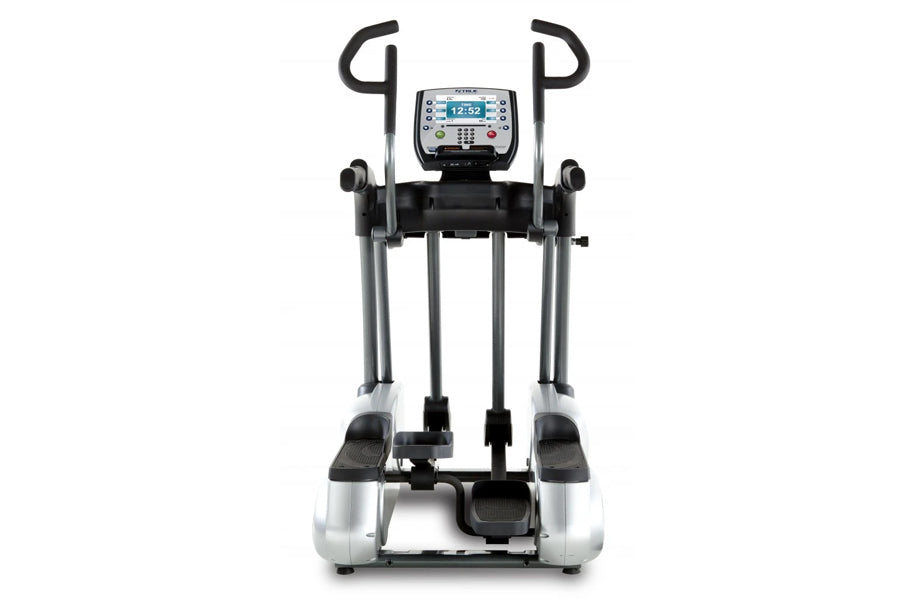 TRUE ES700 elliptical machine with silver frame, black handles and footpeds, digital console display, front view on white bac