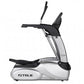 TRUE ES700 elliptical machine with silver frame, black handles and footrest on white background