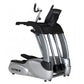 TRUE ES900 elliptical machine with silver frame, black seat and handlebars, digital display console on white background