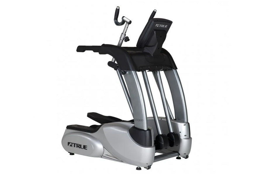 TRUE ES900 elliptical machine with silver frame, black seat and handlebars, digital display console on white background