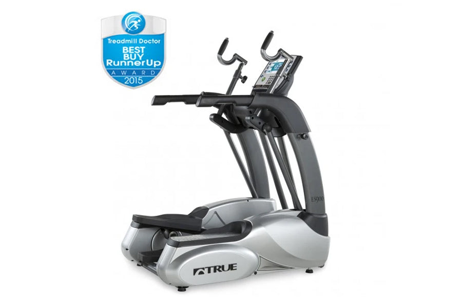 TRUE ES900 elliptical machine with black and silver frame, digital display console, and dual moving handles on white backgrou