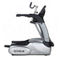 TRUE ES900 elliptical machine with silver and black frame, featuring extended handles and foot pedals on white background