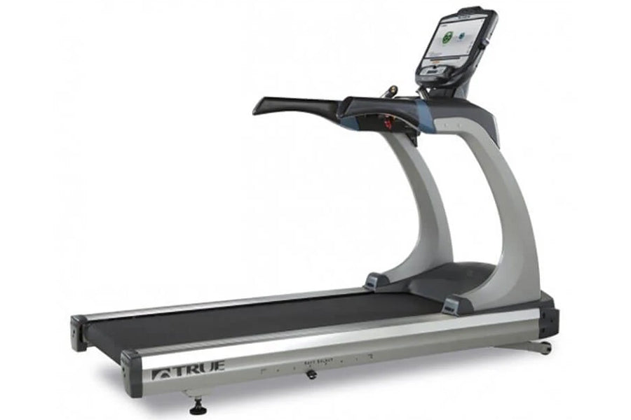 Commercial treadmill with gray frame, black running belt, and digital console display mounted on angled handlebar against whi