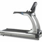 TRUE ES900 treadmill with silver frame, black running belt, and digital console on white background