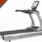 TRUE ES900 commercial treadmill with gray frame, black running belt, digital console, and sold banner overlay