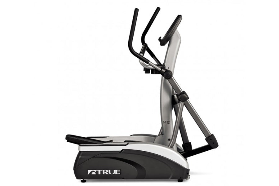 Elliptical machine with a digital display and side steps, labeled as the TRUE M30 Elliptical.