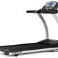 TRUE M30 treadmill with black running deck, silver frame, and digital console display on white background