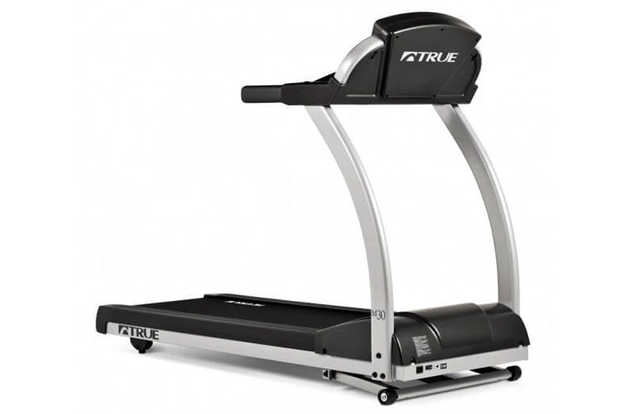 True M30 treadmill with black and silver frame, curved handrails, and digital console on white background