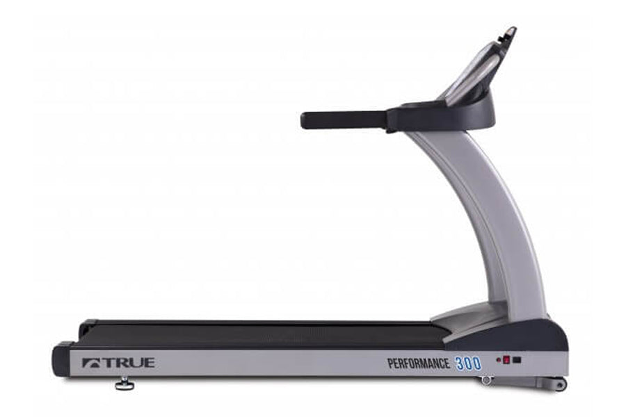 TRUE Performance 300 treadmill with gray frame, black running belt, and digital display console against white background
