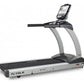 True PS825 treadmill with black running deck, silver frame, and digital touchscreen display mounted on console