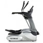 White and black TRUE Performance 300 elliptical machine with gray accents, dual handles, and footplate on white background