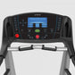 TRUE Z5.0 treadmill console with blue digital display showing cardio challenge metrics, black and silver frame with grip hand