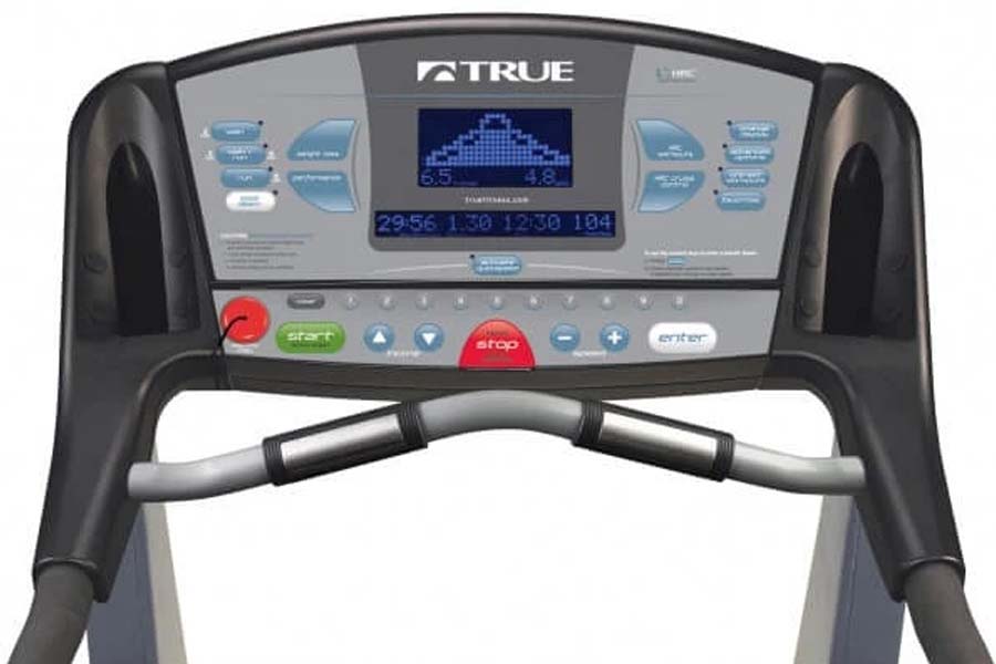 TRUE Z5.4 treadmill with digital console displaying workout metrics, red start button, green interval button, and gray handle