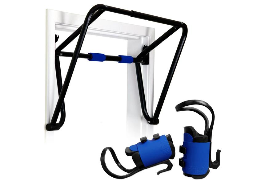 Black and blue inversion rack system with chin-up bar and removable ankle support sleeves on white background