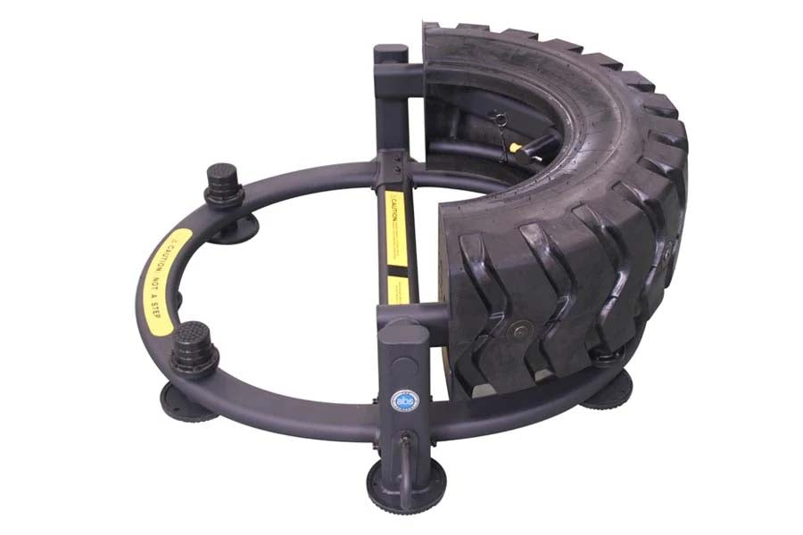 Warrior 180 Tire Flip XL with black rubber tire, yellow accents, and curved handles on white background