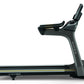 Matrix T75 black treadmill with gray frame and gold accents, shown in side view on white background