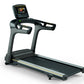 Matrix T75 commercial treadmill with black running deck, gray frame, dual black handles, and digital console display on white