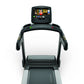 Matrix T75 treadmill with black frame, dual handles, and integrated touchscreen display showing workout interface on white ba