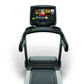 Matrix T75 black treadmill with digital display screen showing workout content, viewed from above on white background