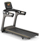 Matrix TF30 folding treadmill with black and gray frame, digital display console, and gold accents on white background
