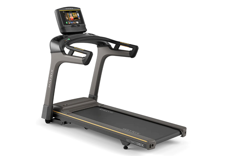 Matrix TF30 folding treadmill with black and gray frame, digital display console, and gold accents on white background