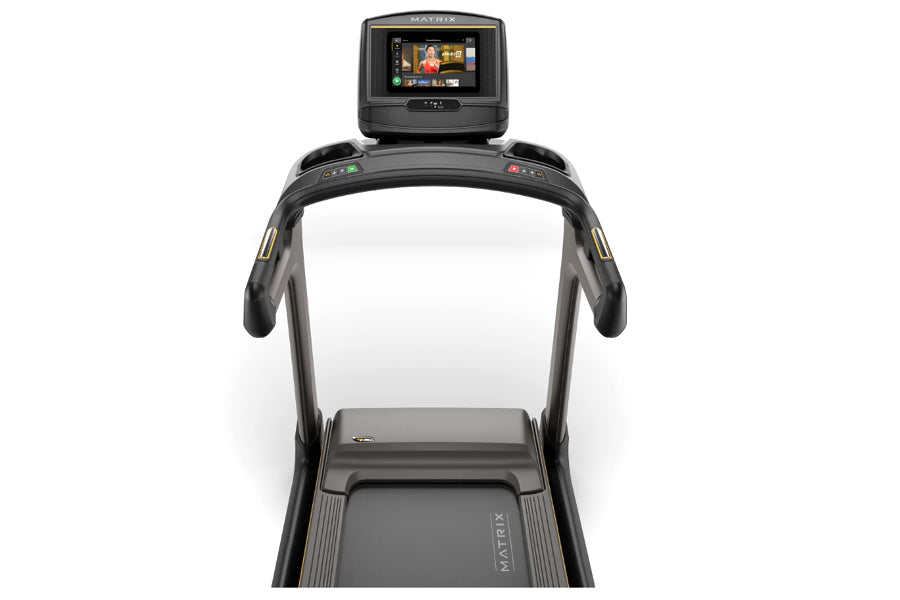 Matrix TF30 folding treadmill with black frame, digital display console, and running belt, front view on white background