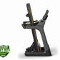 Black and gold Matrix TF30 folding treadmill with digital display console, displayed on white background