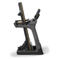 Matrix TF30 folding treadmill with black frame, gold accents, digital console, and handrail controls on white background