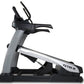 TRUE Alpine Runner treadmill with gray and black frame, black dual handlebars, and silver accents on white background