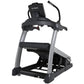 Black and silver True Alpine Runner treadmill with digital console, handrails, and black foot platform on white background