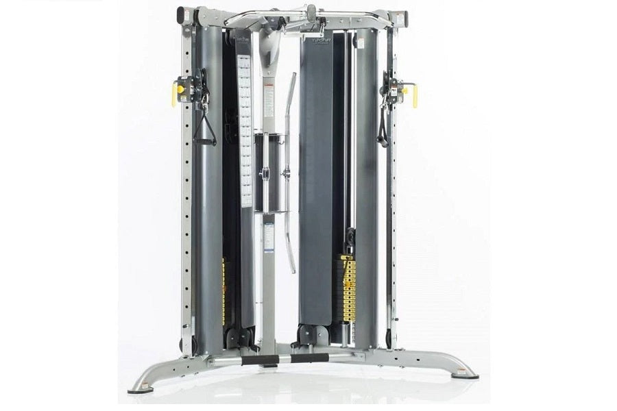 TuffStuff Evolution Corner Multi-Functional Trainer with dual cable columns, pulleys, and weight stacks on white background