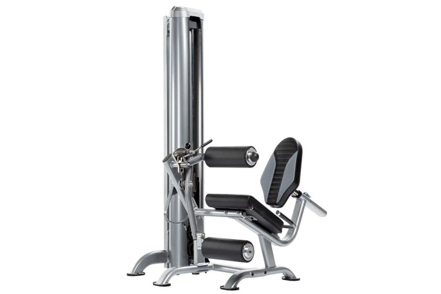 TuffStuff Apollo 7300 3-station multi gym system with silver metal frame, black padded seats and handles, on white background