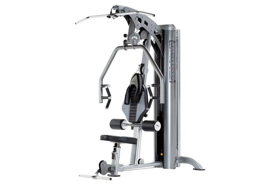 TuffStuff Apollo 7400 silver and black multi-station gym machine with cable pulley system and padded seat on white background
