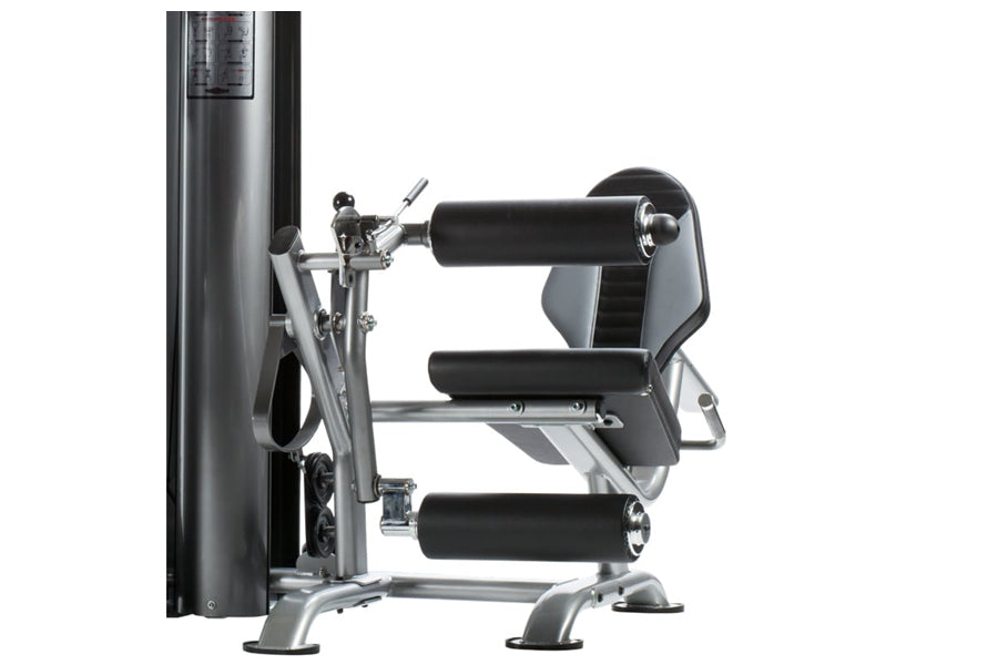 TuffStuff Apollo 7200 2-Station Multi Gym System with black and silver frame, dual padded seats, and cylindrical weight stack