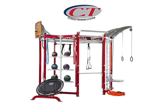Red and silver multi-functional fitness training system with medicine ball storage, suspension rings, cable attachments, and 