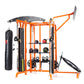 Multi-station gym equipment with bright orange frame, featuring punching bag, shelves with weights and kettlebells, cable mac