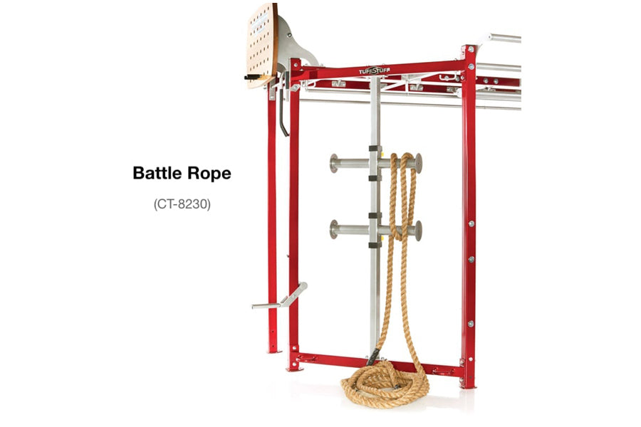 Red and silver TuffStuff functional training rig with coiled tan battle rope attached to metal pegs, on white background