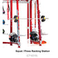Red and silver squat and press racking station with loaded barbells and weight plates, viewed from front on white background