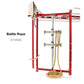 Red metal training rig with tan rope coiled at base, featuring adjustable horizontal bars and pegboard attachment on white ba