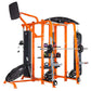 TuffStuff orange and black multi-station workout system with pull-up bar, weight plates, and exercise equipment on white back