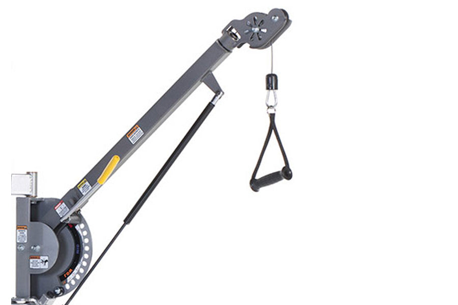 Gray functional trainer machine with extended boom arm, black cable with grip handles, and pulley system on white background
