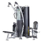 TuffStuff Dual Stack Functional Trainer HTX-2000 with dual cable towers, black and silver frame, adjustable seats, and leg pr