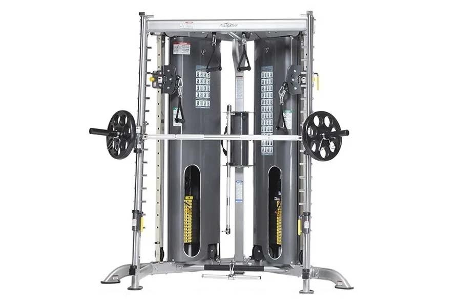 TuffStuff Evolution Corner Multi-Functional Trainer with dual weight stacks, black frame, and rotating handles on white backg