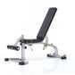 TuffStuff Evolution Deluxe Multi Purpose Bench with adjustable backrest, silver metal frame, black padding, and leg extension