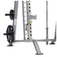 Gray and black Smith machine with dual weight plate pegs, adjustable safety bars, and foot platform on white background