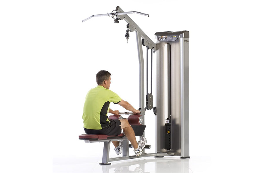 Man in lime shirt using silver and burgundy lat pulldown machine with dual handles on white background