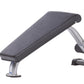 TuffStuff Mini Ab Bench with gray padded seat and silver metal frame on white background